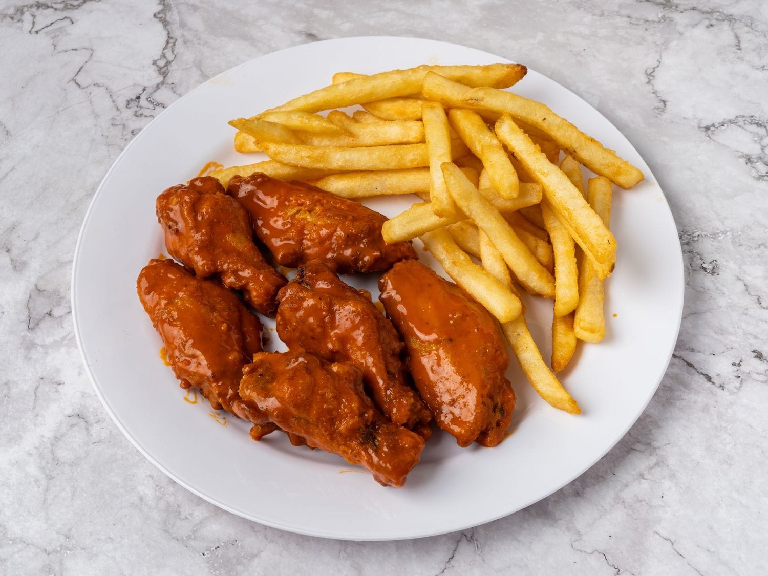 Chicken wing takeout from Mayo Grill Aurora
