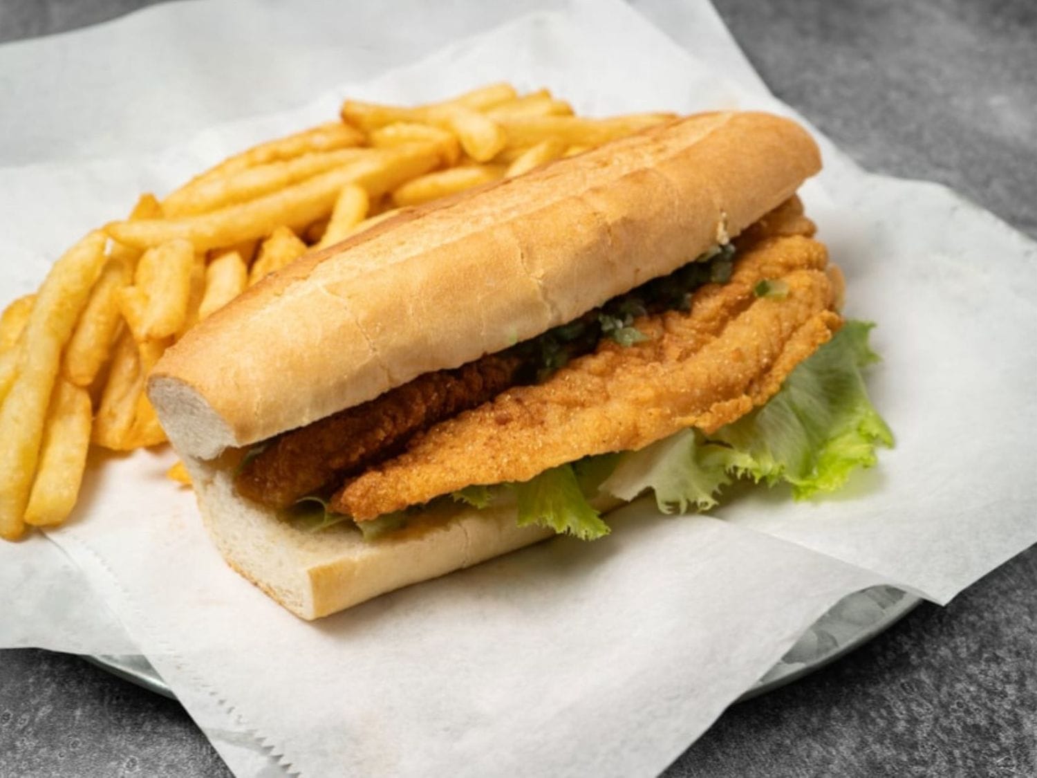 Catfish sandwich and fries from Mayo Grill in Aurora