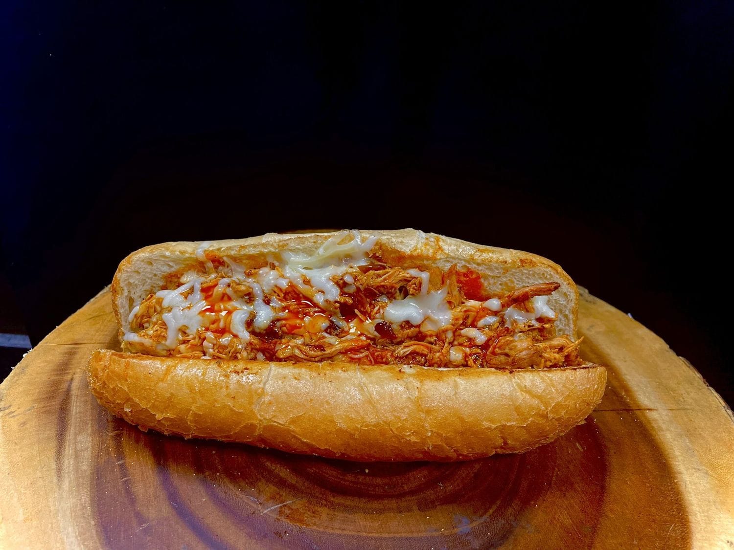 Buffalo chicken Philly sandwich with fries at Mayo Grill