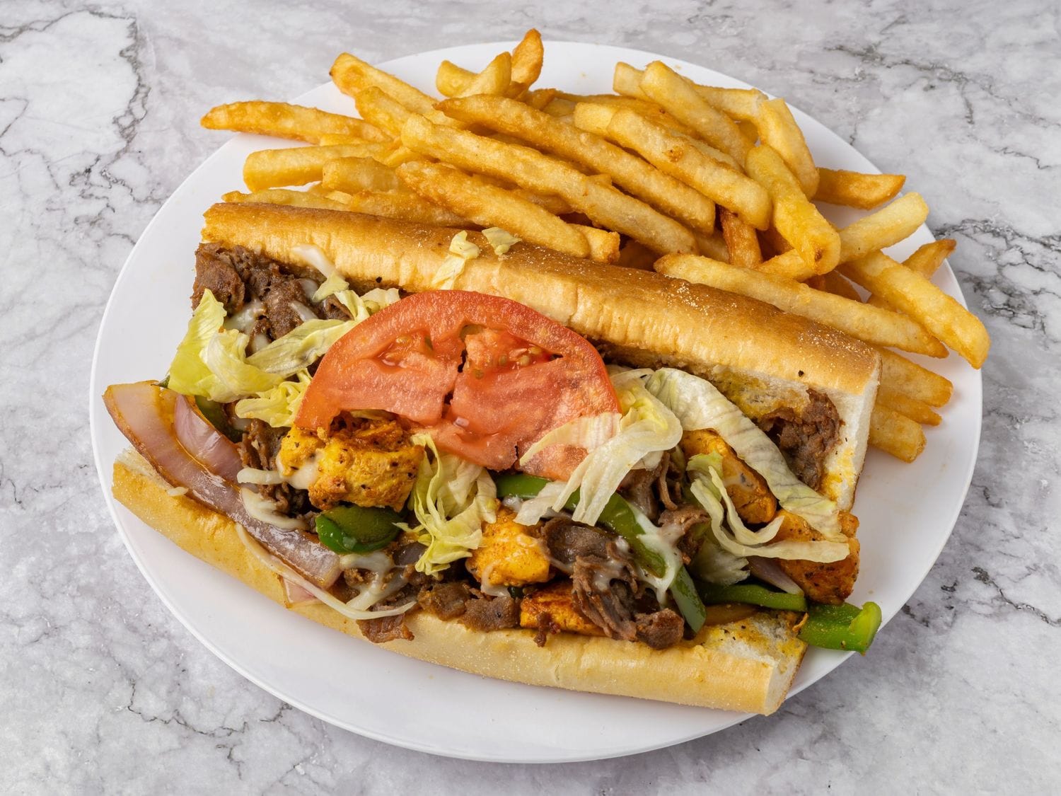Philly Mix sandwich and fries available for takeout from Mayo Grill